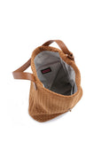 Haute Shore Sandy Hobo Handbag in Woven Saddle Faux Suede