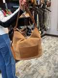 Haute Shore Sandy Hobo Handbag in Woven Saddle Faux Suede