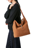 Haute Shore Sandy Hobo Handbag in Woven Saddle Faux Suede