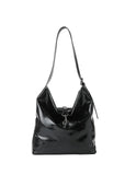 Haute Shore Sandy Hobo Handbag in Black Faux Leather