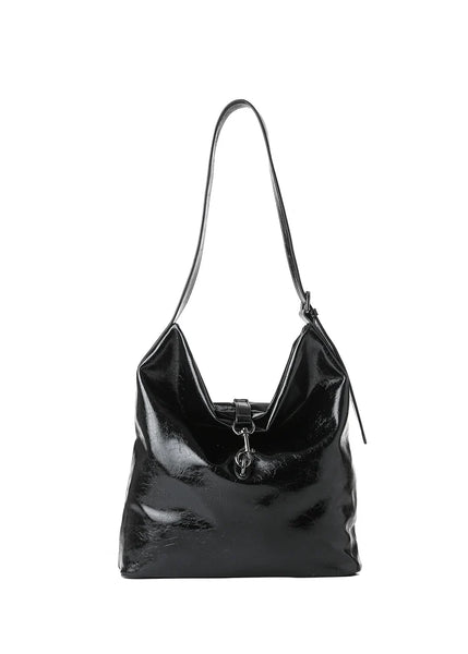 Haute Shore Sandy Hobo Handbag in Black Faux Leather