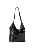 Haute Shore Sandy Hobo Handbag in Black Faux Leather