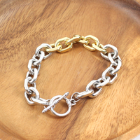 Persuasion Toggle Clasp Silver and Gold Chain Bracelet