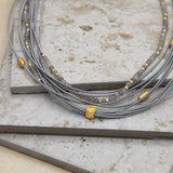 Sea Lily Multi Layer Piano Wire with Faceted Labradorite Bead Necklace